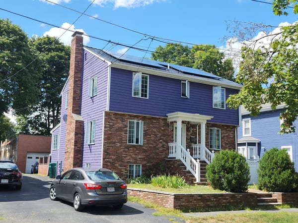 Interlock Aluminum Slate Metal Roofing – Deep Charcoal | Medford, MA (Front-left elevation)