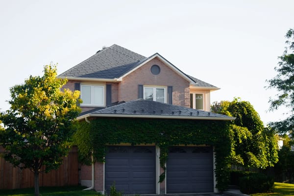 Deep Charcoal Interlock Slate aluminum roof on a Deep Charcoal metal roof on a two-storey home in a, Burlington, Ontario