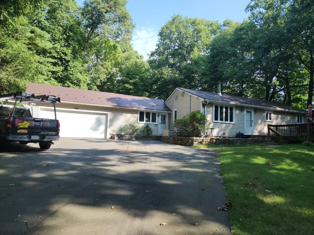 Colonial Brown Interlock metal roof in Burlington, CT