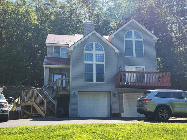 Tile Red Interlock metal roof in Granby, CT