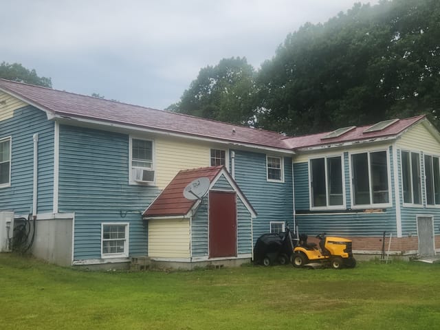 Tile Red Interlock metal roof in Lebanon, ME