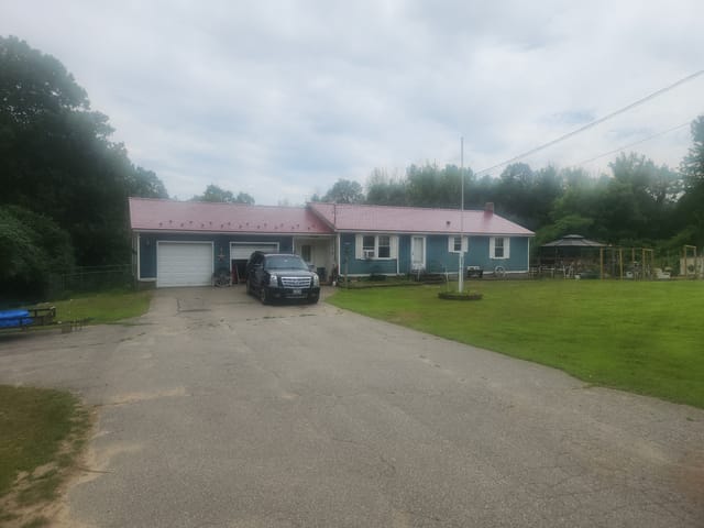 Tile Red Interlock metal roof in Lebanon, ME
