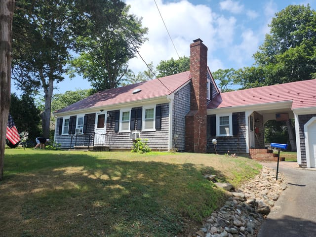 Tile Red Interlock metal roof in Falmouth, MA