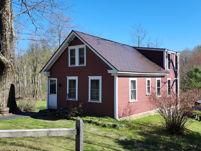 Colonial Brown Interlock metal roof in Jefferson, MA