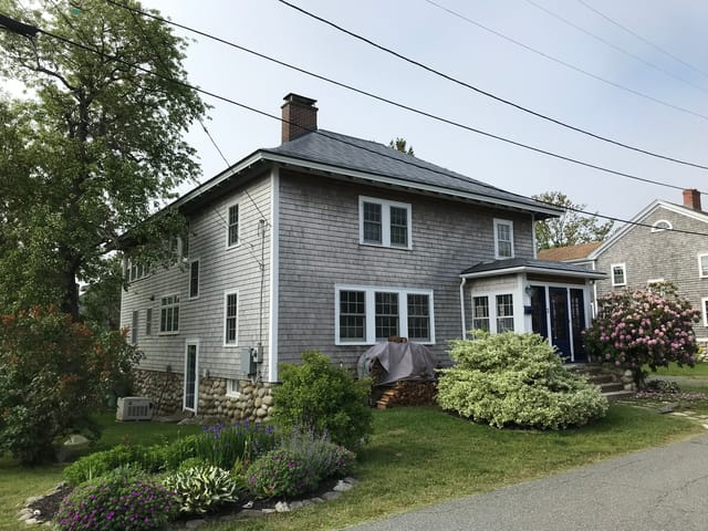Charcoal Grey Interlock metal roof in Rockport, MA