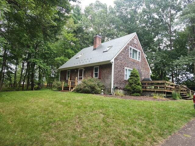 Hunter Green Interlock metal roof in Norton, MA