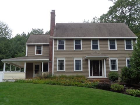 Colonial Brown Interlock metal roof in Rochdale, MA