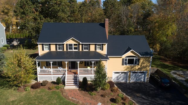 Black Interlock metal roof in Reading, MA