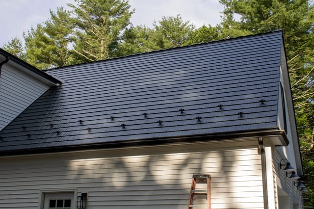Black Interlock metal roof in Foxborough, MA