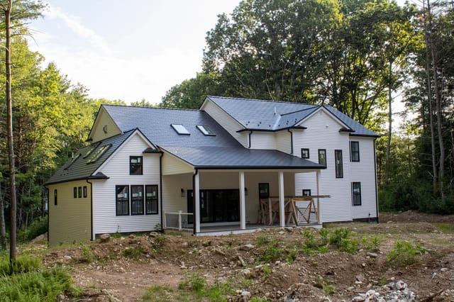 Black Interlock metal roof in Foxborough, MA