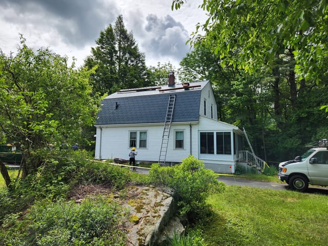 Hunter Green Interlock metal roof in Sharon, MA