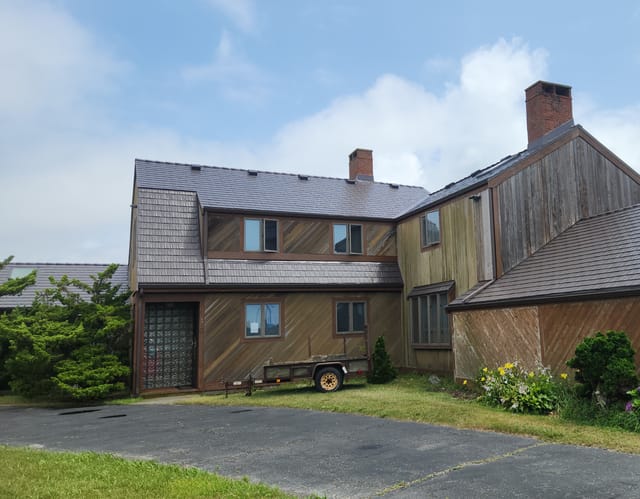 Tudor Brown Interlock metal roof in East Falmouth, MA