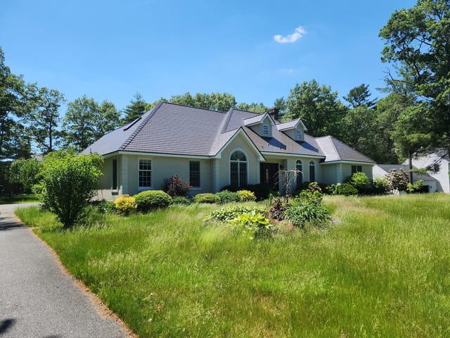 Tudor Brown Interlock metal roof in East Taunton, MA
