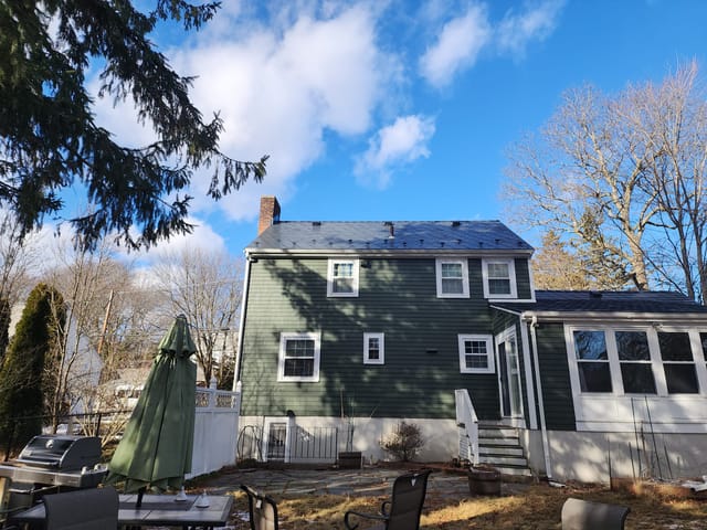 Deep Charcoal Interlock metal roof in Milton, MA