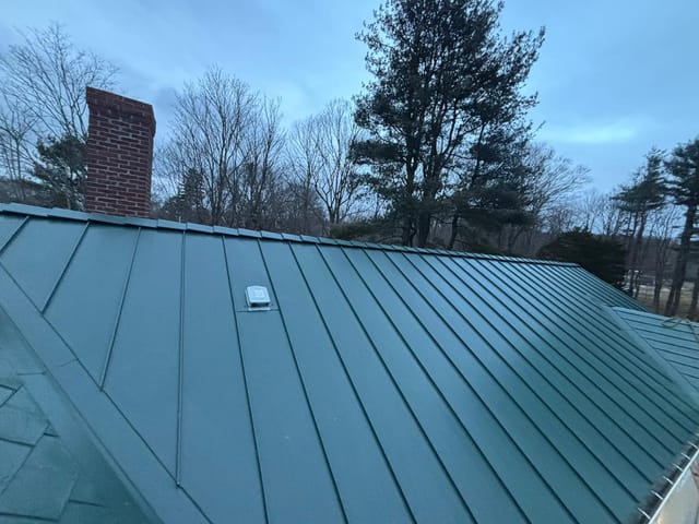 Hunter Green Interlock metal roof in Westwood, MA