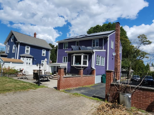 Deep Charcoal Interlock metal roof in Medford, MA