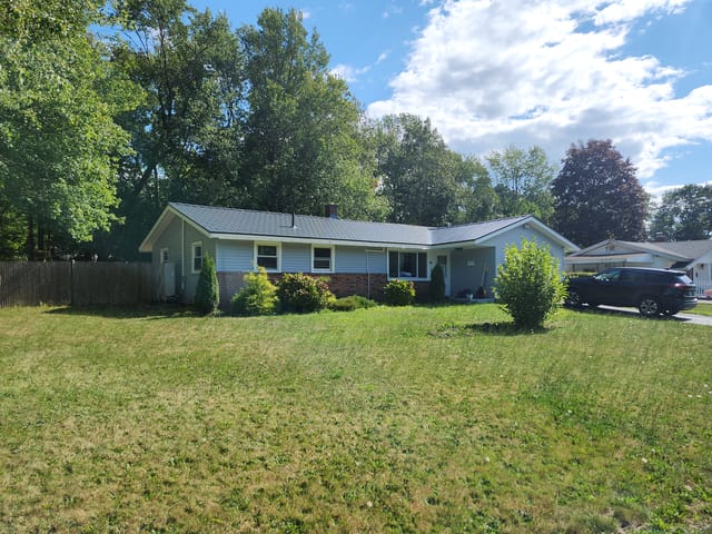 Deep Charcoal Interlock metal roof in Brockton, MA