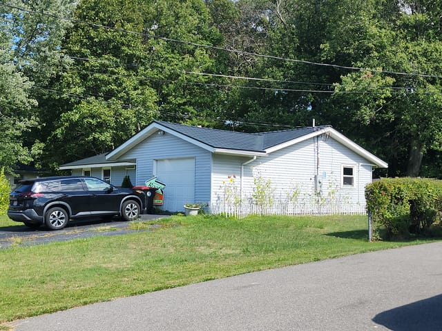 Deep Charcoal Interlock metal roof in Brockton, MA