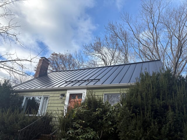 Deep Charcoal Interlock metal roof in Maynard, MA