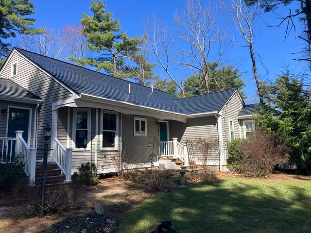 Black Interlock metal roof in Stoughton, MA