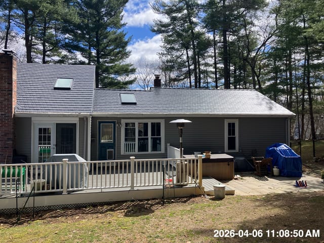 Black Interlock metal roof in Stoughton, MA