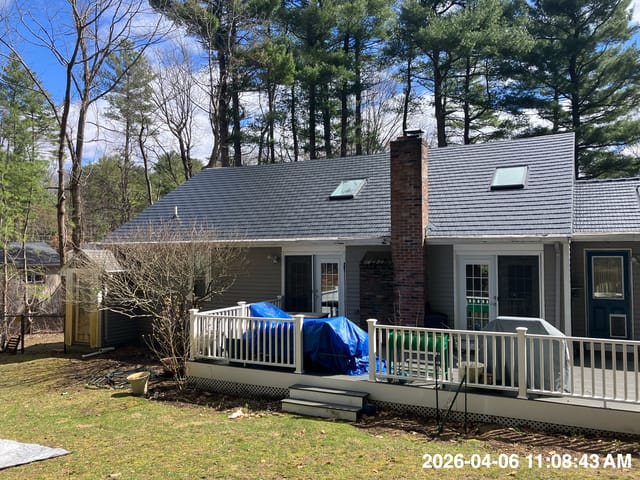 Black Interlock metal roof in Stoughton, MA