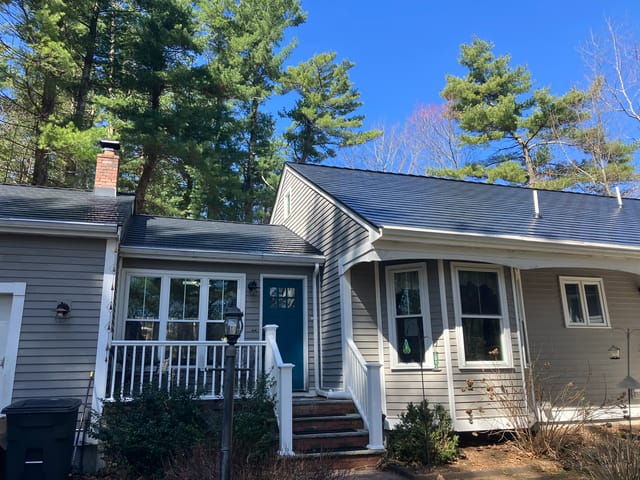 Black Interlock metal roof in Stoughton, MA