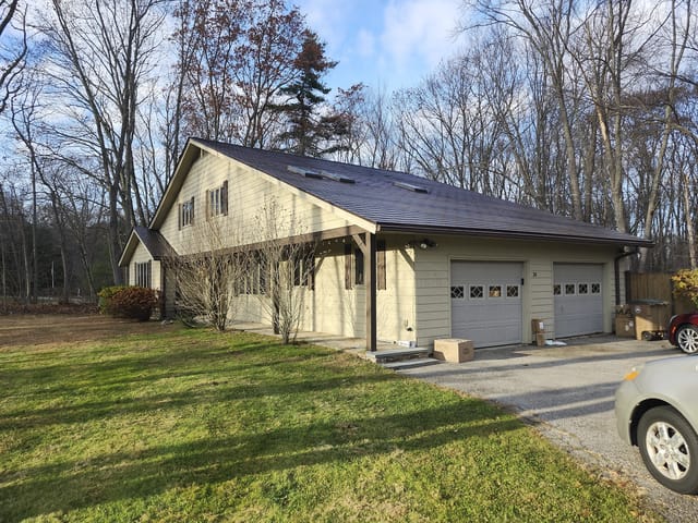 Colonial Brown Interlock metal roof in Atkinson, NH