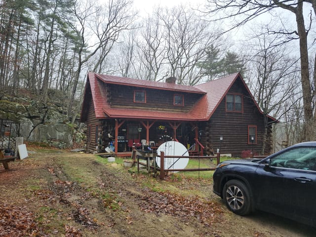 Tile Red Interlock metal roof in Barrington, NH