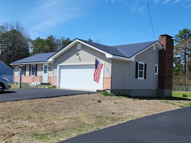 Black Interlock metal roof in Concord, NH