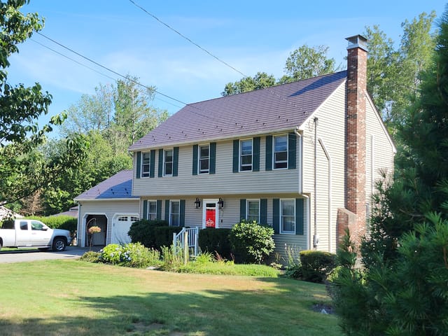 Colonial Brown Interlock metal roof in Pelham, NH