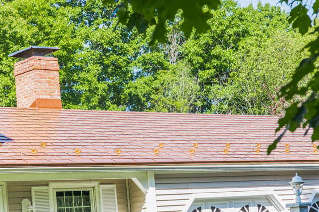 Aged Copper Interlock metal roof in North Hampton, NH