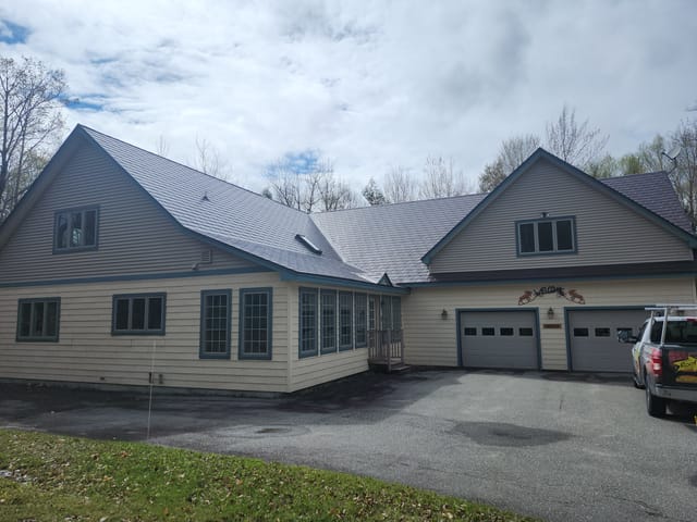 Colonial Brown Interlock metal roof in Gorham, NH