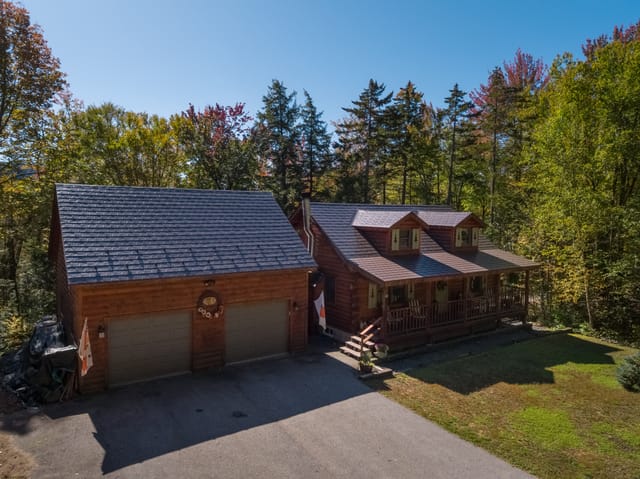 Tudor Brown Interlock metal roof in Thornton, NH
