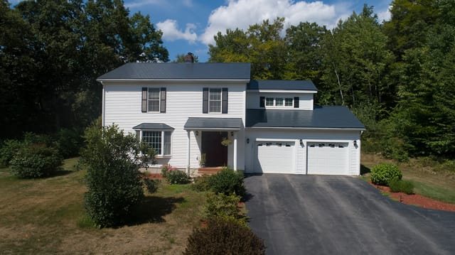 Charcoal Grey Interlock metal roof in Webster, NH