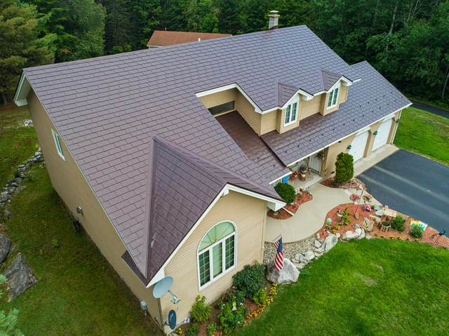 Colonial Brown Interlock metal roof in Milan, NH