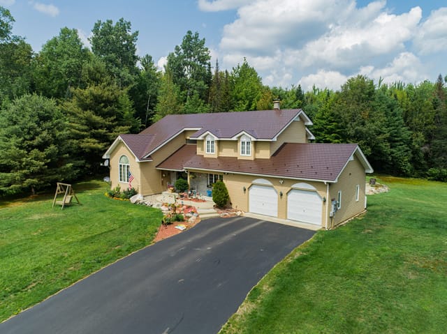 Colonial Brown Interlock metal roof in Milan, NH