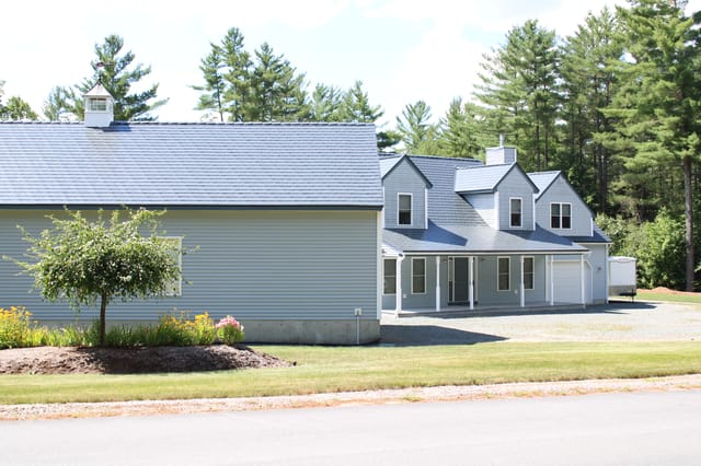 Deep Charcoal Interlock metal roof in Thornton, NH