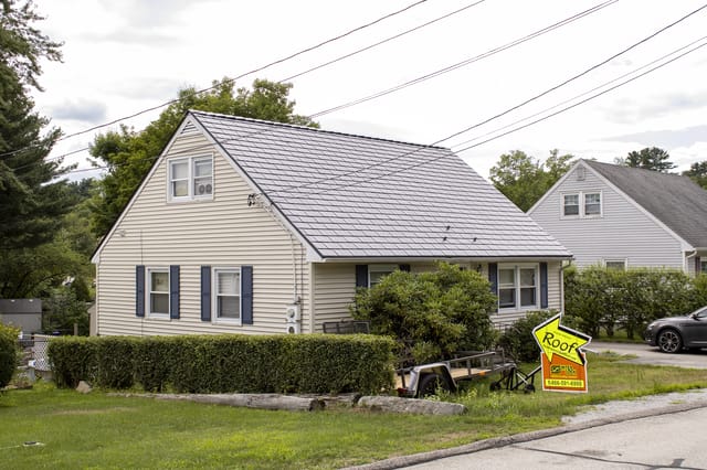 Deep Charcoal Interlock metal roof in Manchester, NH
