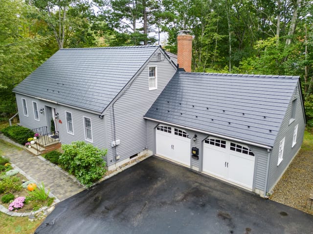 Black Interlock metal roof in Rochester, NH