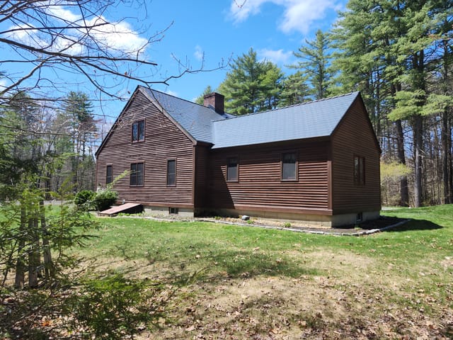 Deep Charcoal Interlock metal roof in Alton, NH