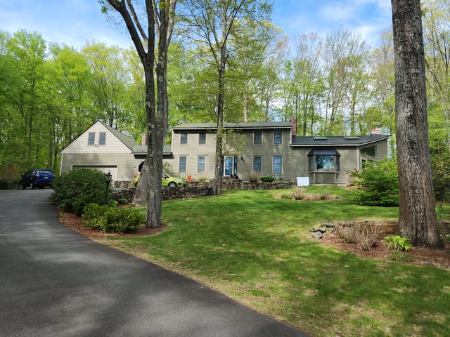 Black Interlock metal roof in Rochester, NH