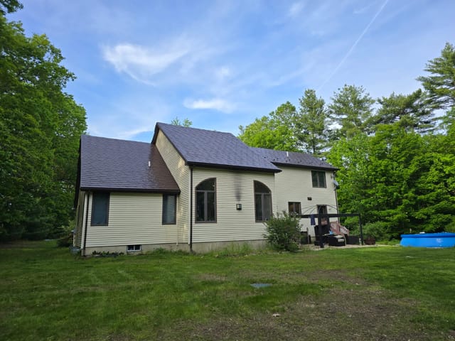 Colonial Brown Interlock metal roof in Nottingham, NH
