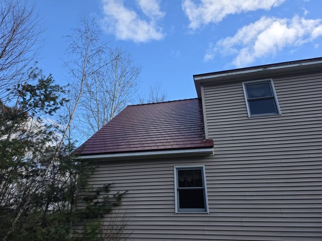 Tile Red Interlock metal roof in Deerfield, NH