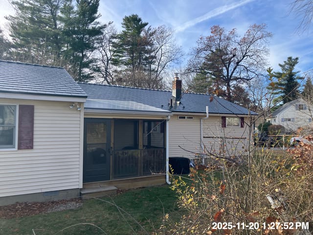 Hunter Green Interlock metal roof in Dover, NH