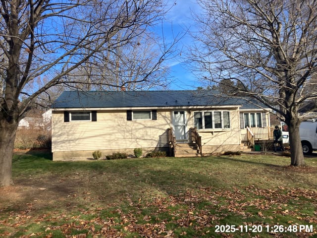 Hunter Green Interlock metal roof in Dover, NH