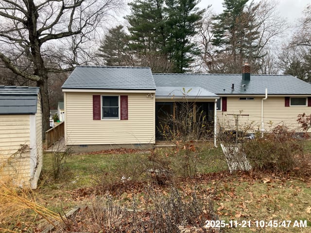 Hunter Green Interlock metal roof in Dover, NH