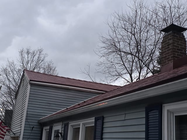 Tile Red Interlock metal roof in Hookset, NH