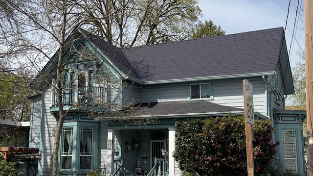 Black Interlock metal roof in Eugene, OR