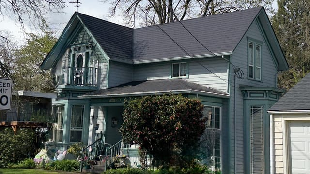 Black Interlock metal roof in Eugene, OR